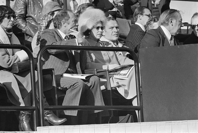 queen at football game